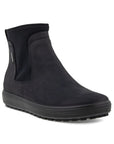 An Ecco black nubuck ankle boot with textile side paneling and a black outsole.