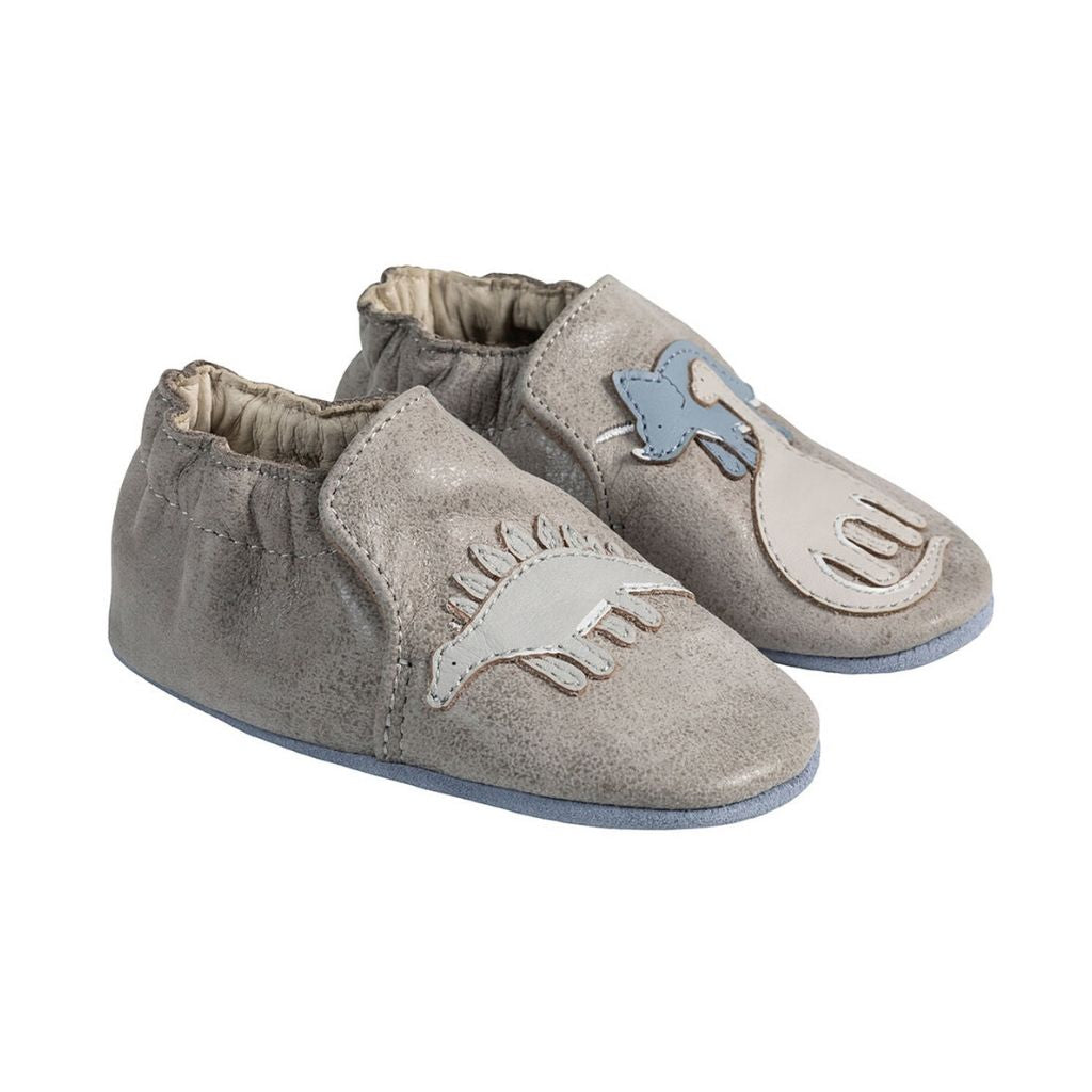 Grey leather pull on kids shoe with dinosaurs.