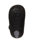 Black outsole of with Soft Motion tread pattern and Stride Rite logo stamped on heel in grey.