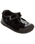 Black patent leather Mary-Jane with floral cutout detail.