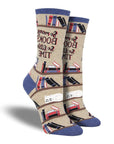 Women's cotton crew socks in beige with bookshelf, books, and cat sleeping on shelf.