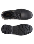 View of the top and the outsole of Topton Mid boot. Black rubber tread for grip with Clarks logo in center.