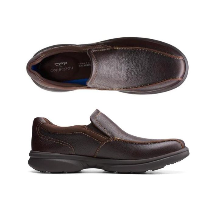 Top and side view of brown leather slip-on shoe with bicycle toe. Clarks logo on heel of insole.