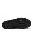 Durable treaded rubber sole of the Men's Martino Outback Wool Dual-Zip Waterproof Boot, designed for traction in snowy and wet winter conditions.