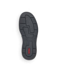 Black outsole on slip on sneaker with red Rieker logo stamped on heel.