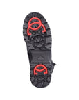 Close-up of Rieker F5493 boot sole showing red collapsible ice cleats for enhanced grip on slippery winter surfaces.