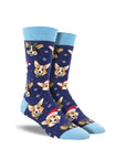 Blue socks with festive corgi dogs wearing Santa hats, antlers and scarves.