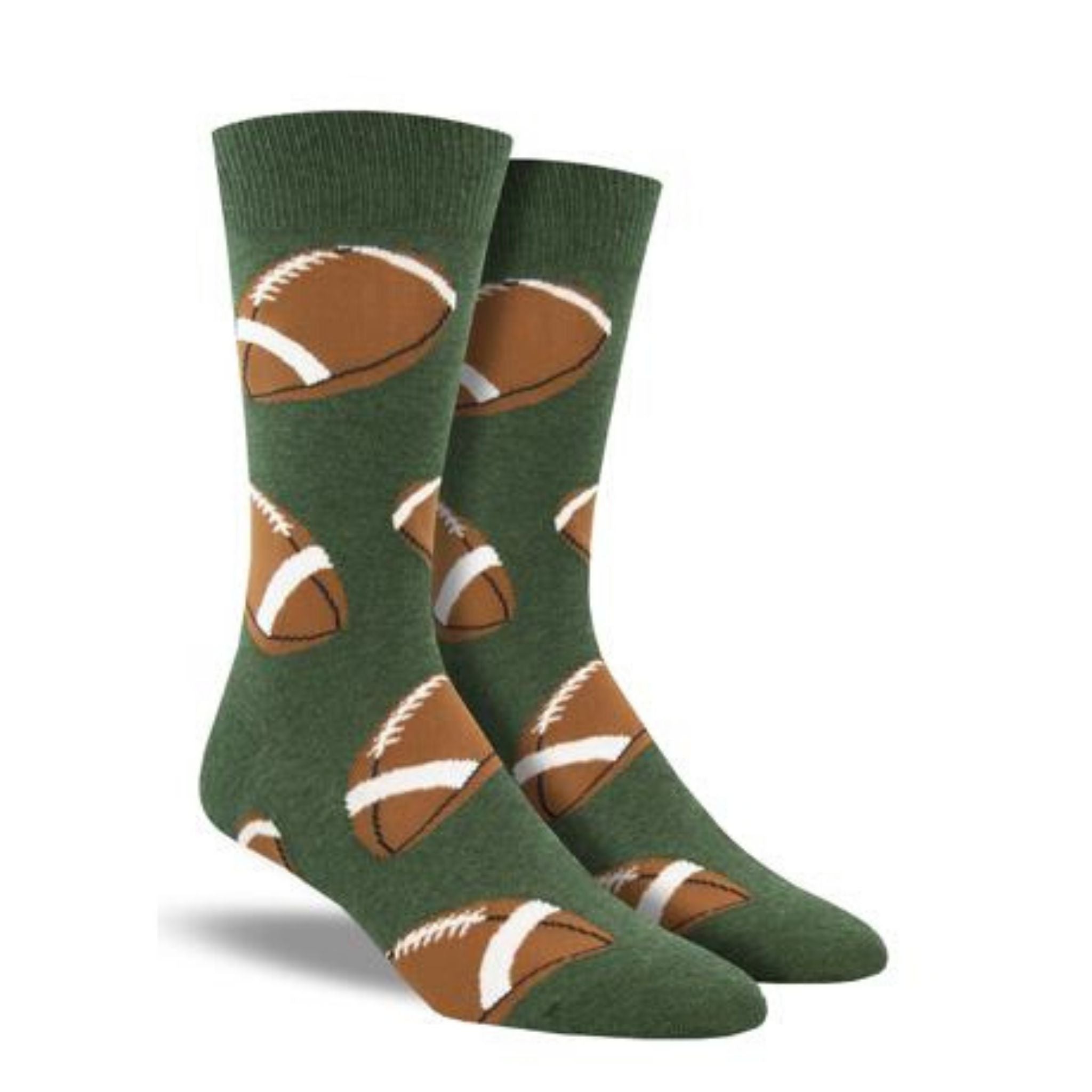 A pair of men's green crew socks with footballs on them.