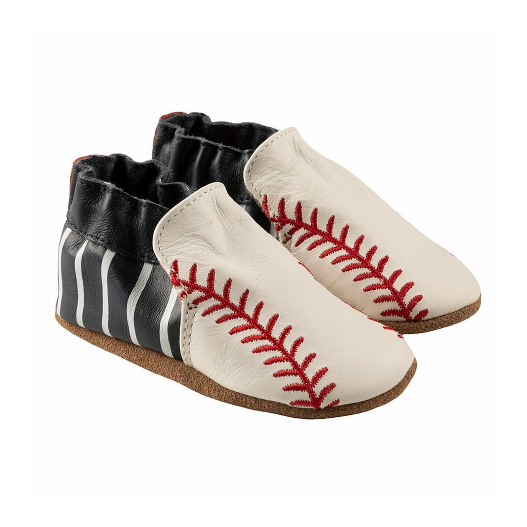 Robeez Robinson soft sole baby shoes with white leather front and red baseball stitching, featuring black and white striped heel design.