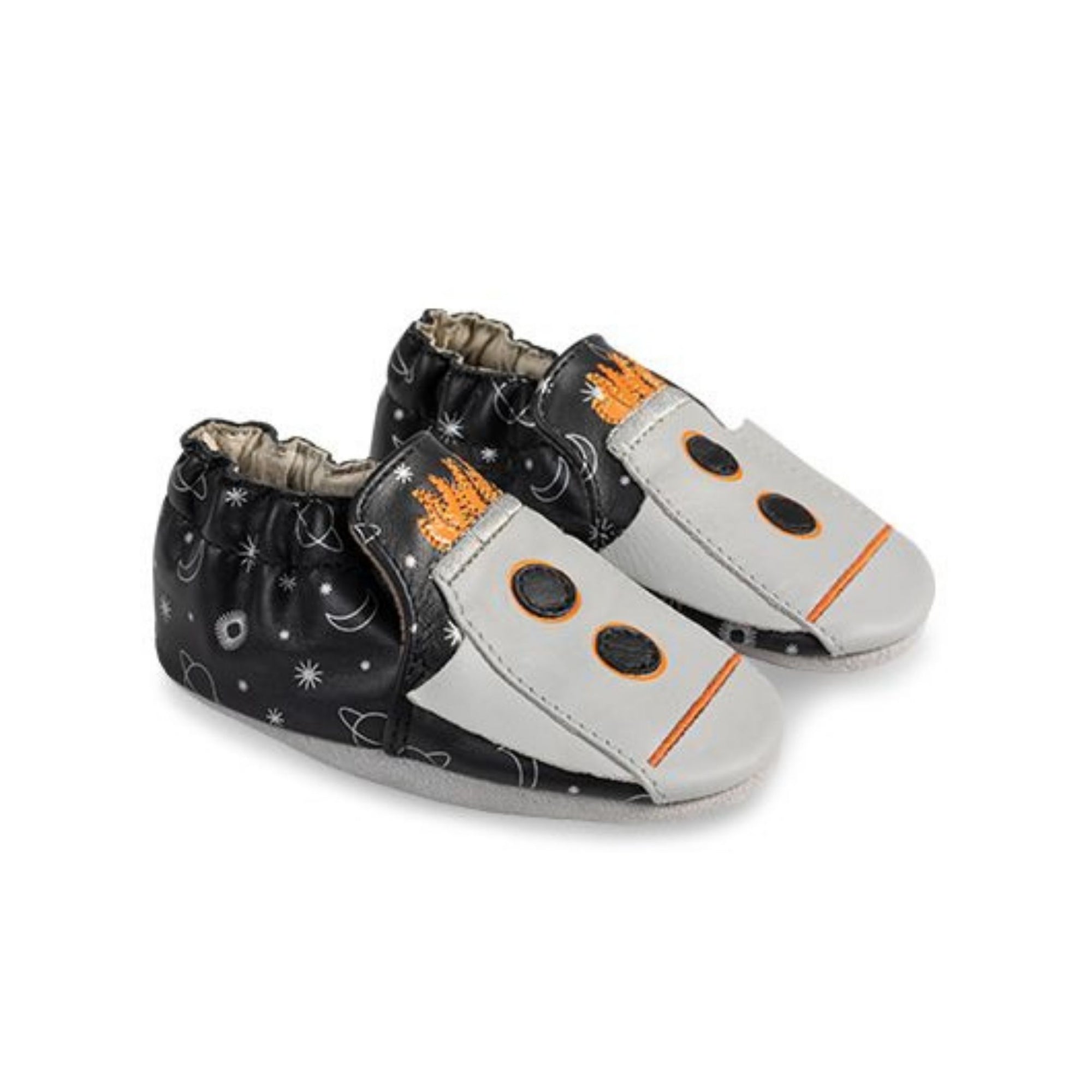 Pair of Robeez soft soles with black space design and rocket ships on toes