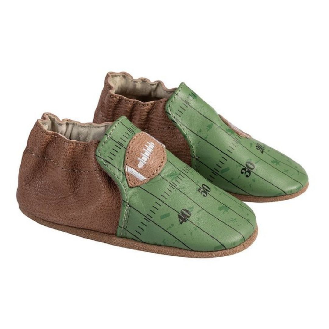 Robeez Soft Sole shoe with brown back and green toe featuring football field and football