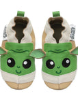 Brown and green leather baby shoes that look like Baby Yoda. Star Wars logo tags sewn on outside.