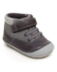 Kids Stride Rite Felix Soft Motion Bootie in gray leather and suede with hook-and-loop strap, ideal for toddler comfort and support.