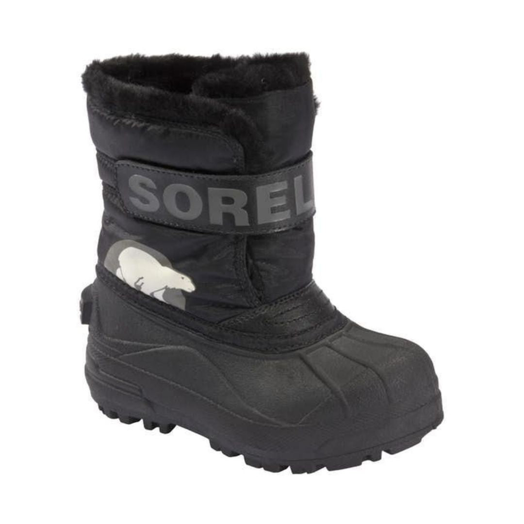 Black winter boot with velcro strap, black rubber foot and faux fur trim