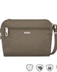 Small taupe crossbody bag with silver Travelon logo in center below full length zipper.