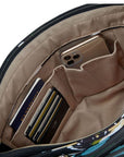 Close-up of Travelon Anti-Theft Addison Tote interior with RFID card slots, passport holder, and phone pocket.