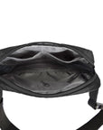 Interior of Travelon Anti-Theft Convertible Sling/Waist Pack with multiple compartments for organized travel essentials.
