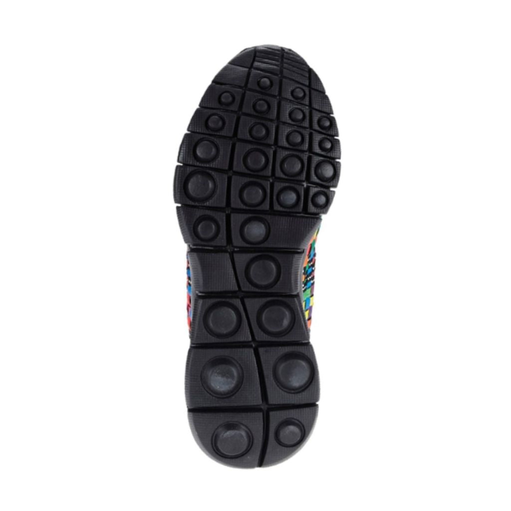 Black treaded outsole with circles for grip on the rainbow Comfi sandal by Bernie Mev
