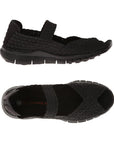 A pair of black Bernie Mev sandals with woven elastic upper, a peep toe and strap across the top of the foot with a closed in heel, logo'd black footbed and a rocker bottom black outsole.
