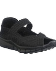 Black woven fabric upper with a peep toe and over the foot strap and closed heel Comfi Sandal by Bernie Mev
