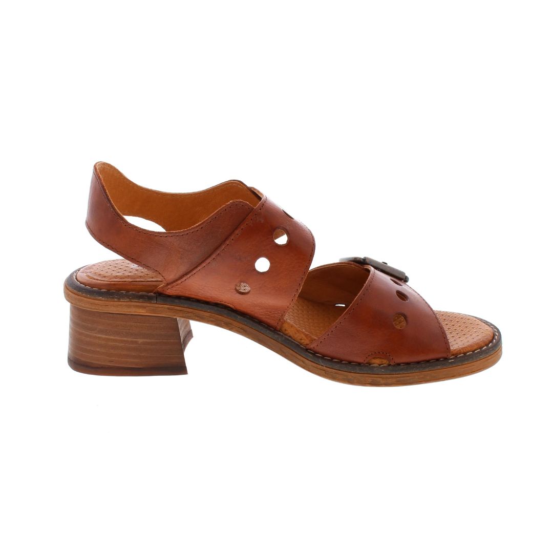 Brown sandal with backstrap and two adjustable straps with oversized buckles. Sandal has stacked block heel.