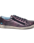 Purple metallic leather sneaker with lace and zipper closure and beige outsole. 