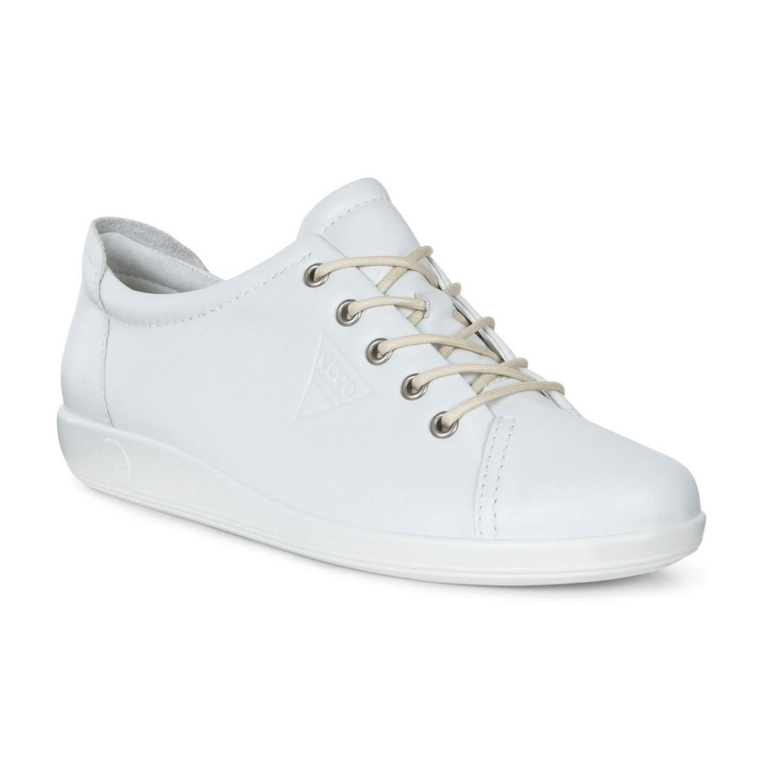 An all white leather sneaker with pewter eyelets, and off-white laces. Ecco logo is embossed on the side.