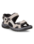 Yucatan sandal in Atmosphere. Beige nubuck upper with black accents. Sandal has 3 adjustable straps. Footbed is black, midsole is grey, outsole is black.