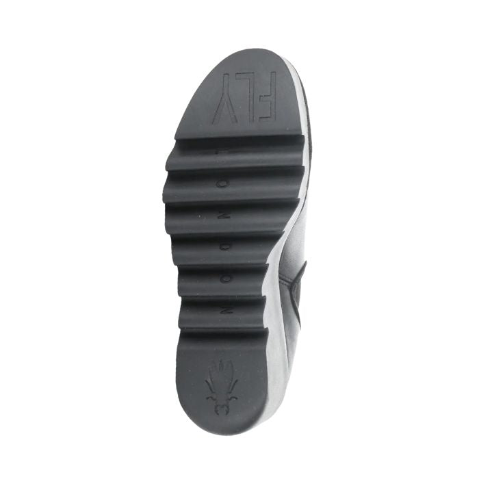 Bottom sole of Women's FLY London Byne Wedge Boot with bold FLY London branding and grooved rubber outsole for traction and durability.