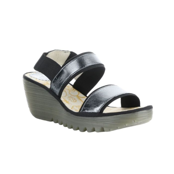 Women's FLY London Yaco Crossover Wedge Sandal in black with glossy leather straps and lugged outsole, ideal for stylish comfort.
