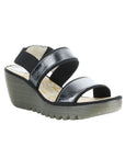 Women's FLY London Yaco Crossover Wedge Sandal in black with glossy leather straps and lugged outsole, ideal for stylish comfort.