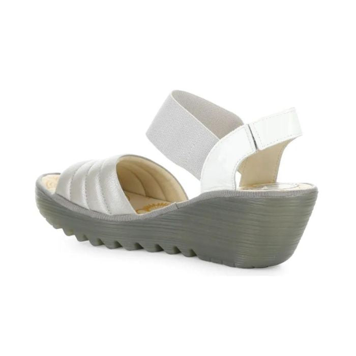 Side view of Yiko Wedge in silver.