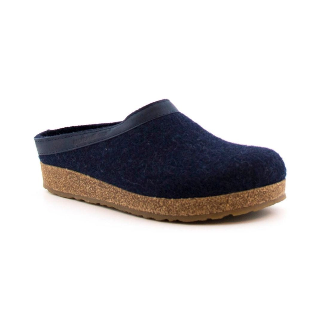 Grizzly Wool Clog in Captains Blue. Navy blue wool upper with a cork midsole and brown rubber outsole. Navy leather band around the heel.