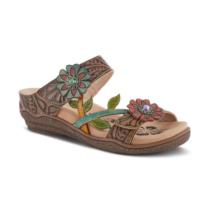 Brown slide sandal with floral details. Sandal has brown crepe rubber outsole with small wedge.
