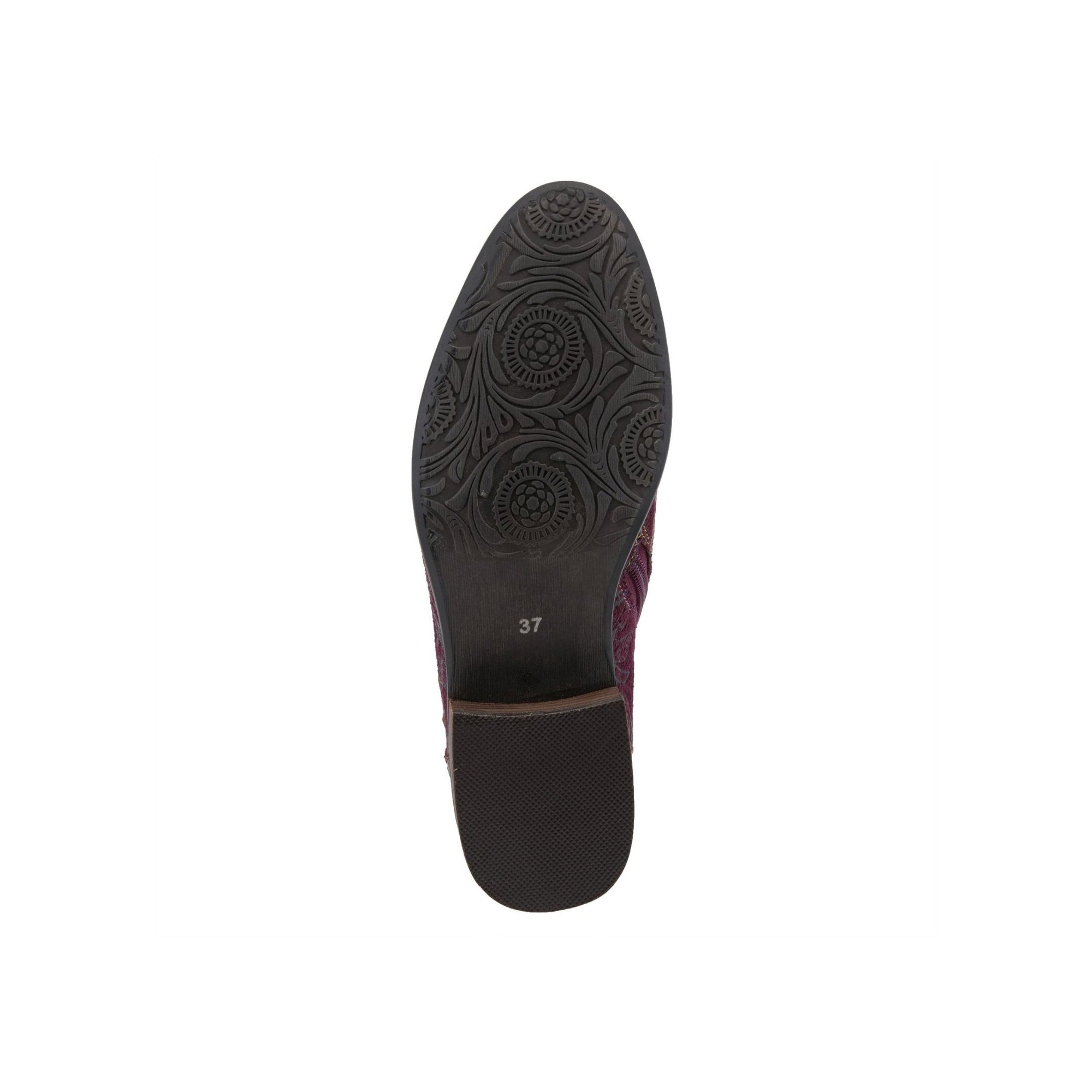 Black rubber outsole with embossed floral pattern.