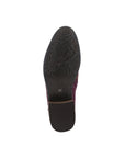 Black rubber outsole with embossed floral pattern.