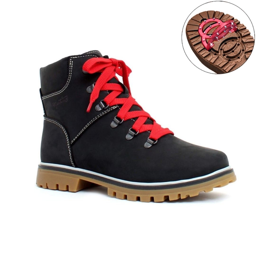 Maika Lace-Up Boot in Black. Black nubuck ankle boot with red laces, white stitching, and a brown rubber outsole. Outsole features red ice-grips.