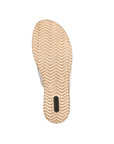 Outsole of white Rieker D6456 women's slide wedge sandal with herringbone tread pattern for enhanced grip and comfort.