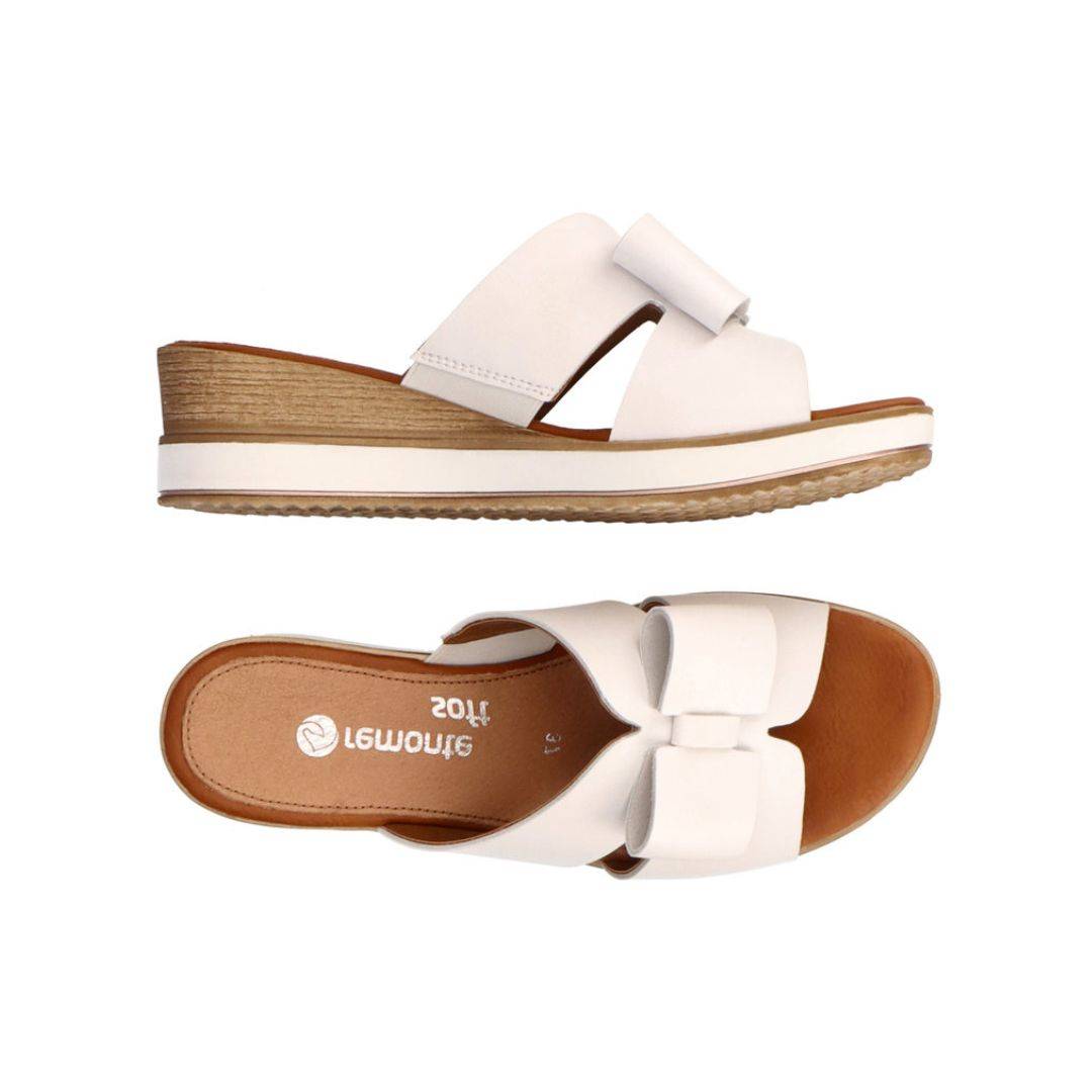 Side and top view of white Rieker D6456 women's platform wedge sandal, featuring open-toe design and lightweight sole.