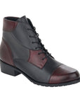 Women's Remonte D6882 lace-up leather boot in black and burgundy tones, combining elegance and comfort for seasonal wear.