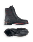Women's black winter boot with adjustable laces and zupper closure.