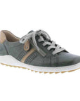 Green lace-up sneaker with beige accents, side zipper, accent stitching, and white midsole.