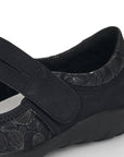 Close-up of black Remonte R3510 Mary-Jane Flat showing floral detailing and adjustable strap for a secure and stylish fit.