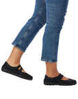Model wearing black Remonte R3510 Mary-Jane Flats with jeans, demonstrating flexible fit and stylish casual appeal.