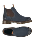 Top and side views of navy Women's Remonte D8472 Chelsea Boot showing waterproof leather upper and flexible, shock-absorbing outsole.