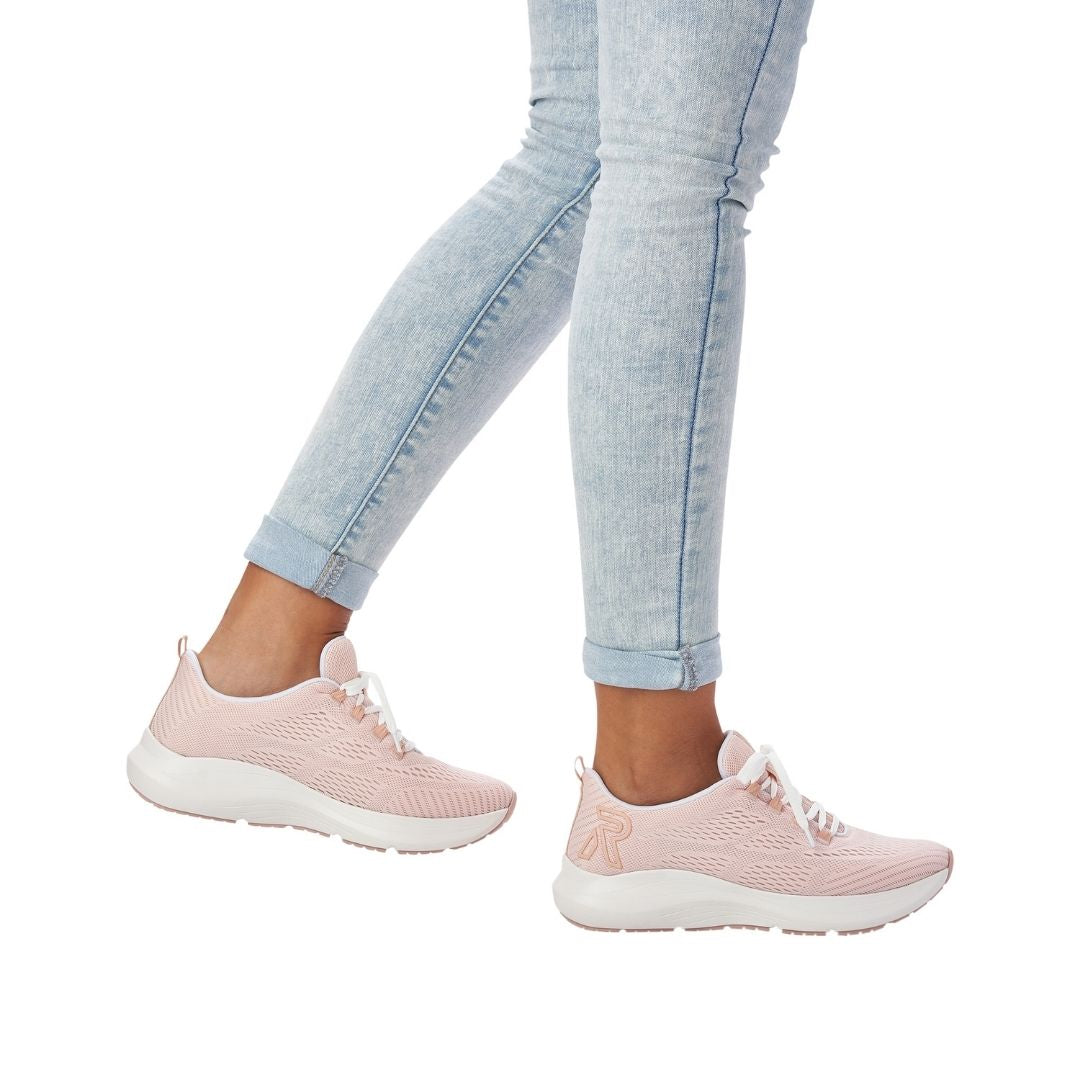 Women wearing pink mesh lace up sneakers by R-Evolution by Rieker