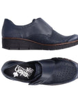 Top and side view of navy Rieker 537C0 slip-on shoes for women, featuring flexible sole and textured upper for casual fall outfits.