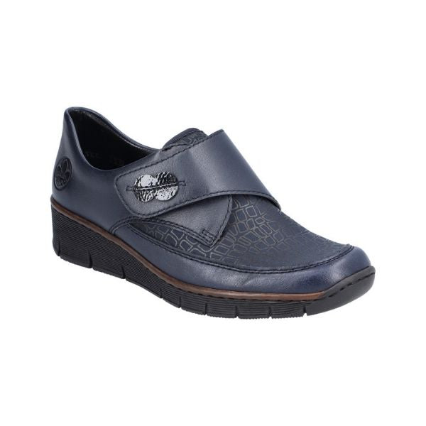 Navy blue Rieker 537C0 women's slip-on shoes with wedge heel and embossed pattern, perfect for stylish and lightweight everyday wear.
