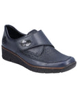 Navy blue Rieker 537C0 women's slip-on shoes with wedge heel and embossed pattern, perfect for stylish and lightweight everyday wear.