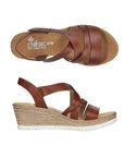 Side and top view of Women's Rieker 61937 sling-back platform wedge showcasing cushioned insole and stylish woven heel design.